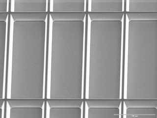 SEM-image of Stencil-mask with array of recangular-frames and 15° sidewall-tapering.